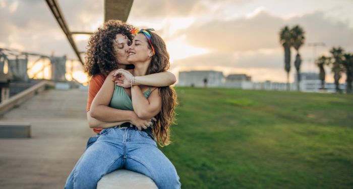 woman kissing lesbians.jpg.optimal